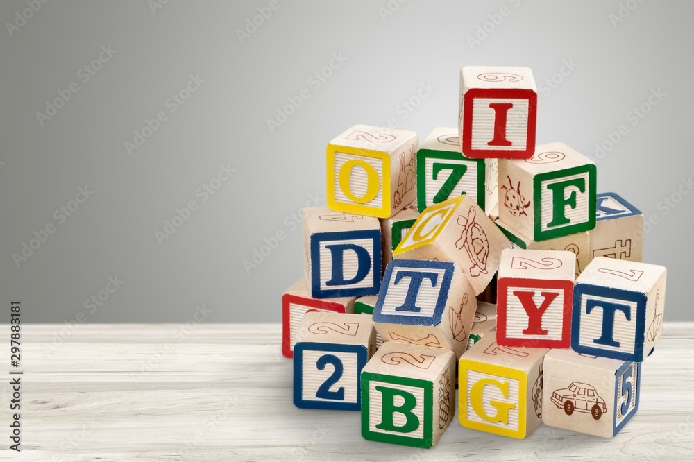 Wooden cubes on table background