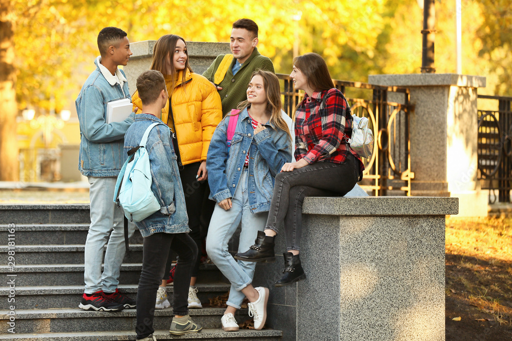 Group of teenage students outdoors