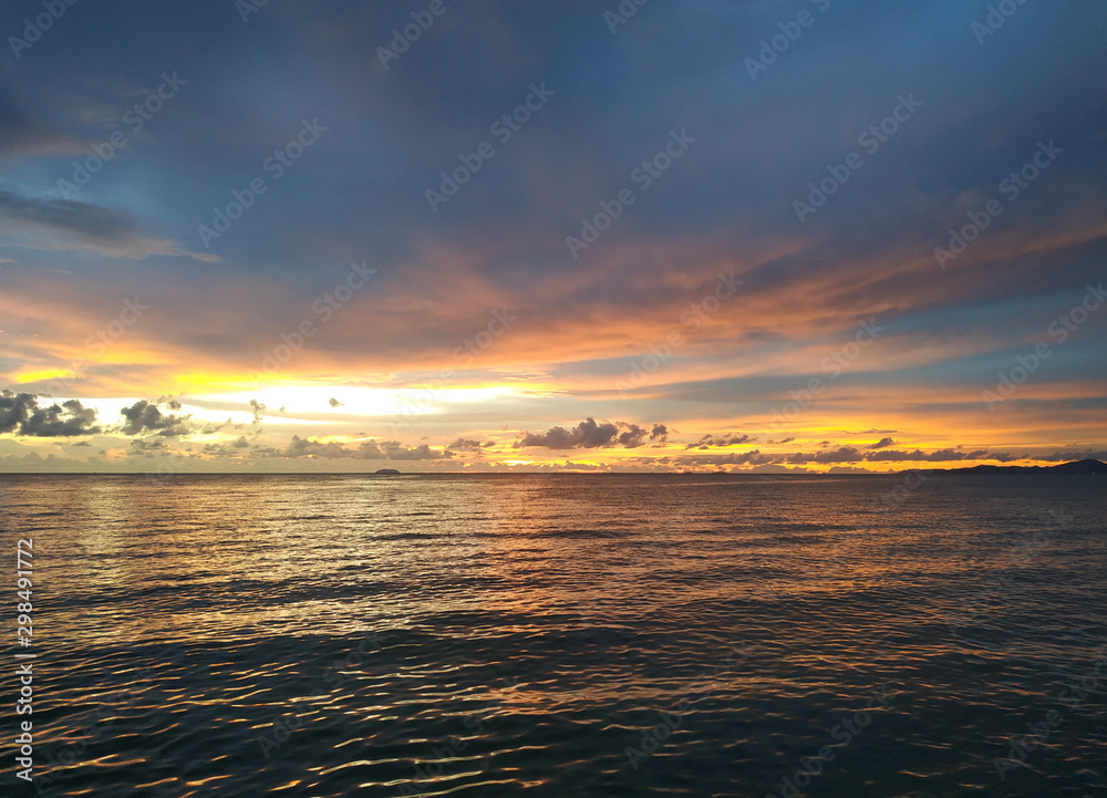 Beautiful sunset sky above clouds with dramatic light