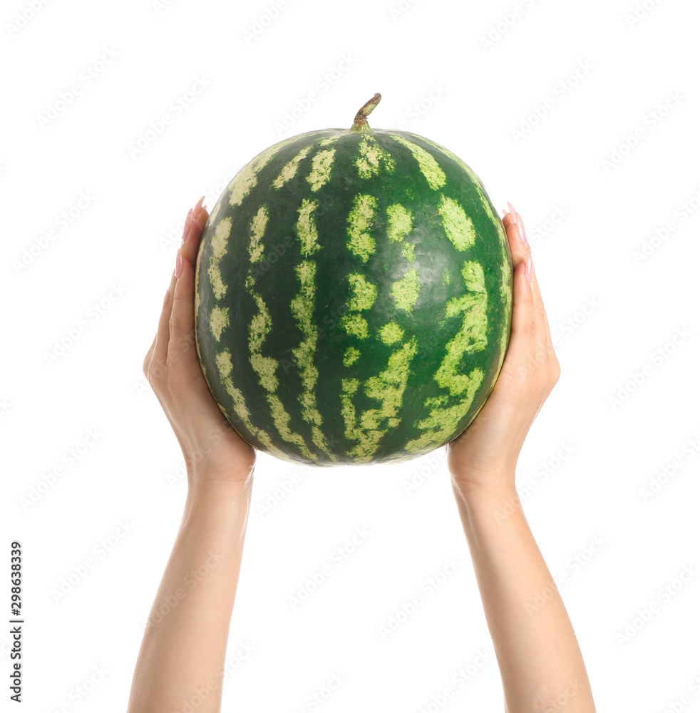 Female hands with ripe watermelon on white background