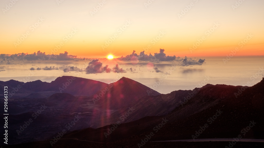 The very first rays of sun at the Haleakala volcano crater