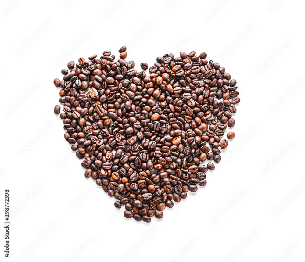 Heart made of coffee beans on white background