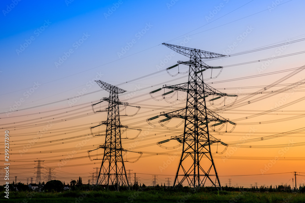 High voltage electricity tower sky sunset landscape,industrial background.