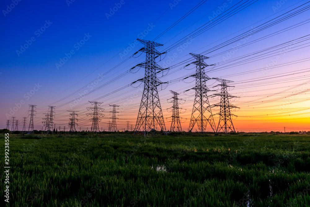 High voltage electricity tower sky sunset landscape,industrial background.