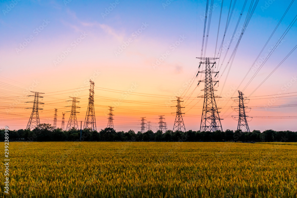 High voltage electricity tower sky sunset landscape,industrial background.