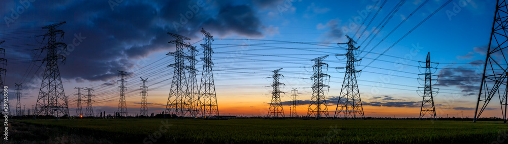 High voltage electricity tower sky sunset landscape,industrial background.