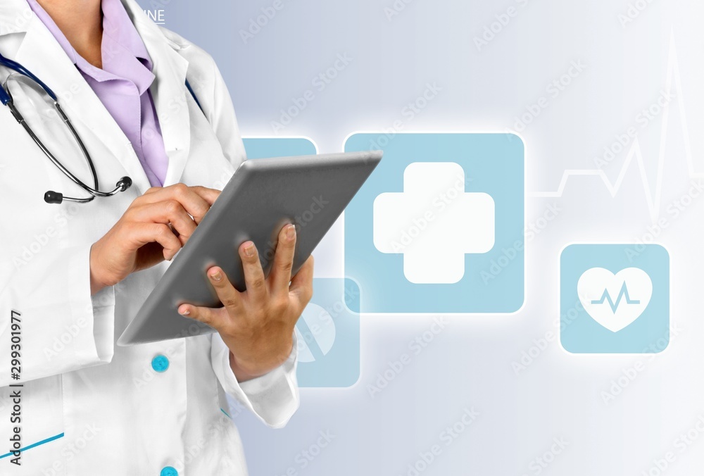 Close-up Doctor at hospital working with tablet pc