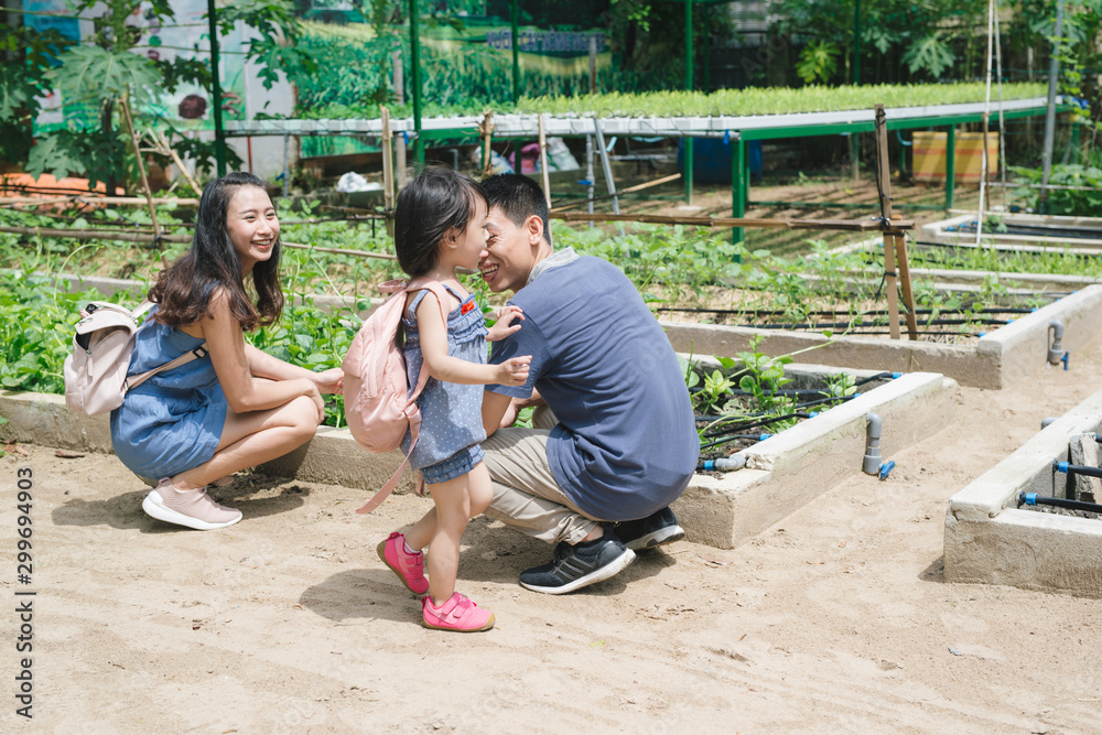 Mother and daughter engaged in gardening together