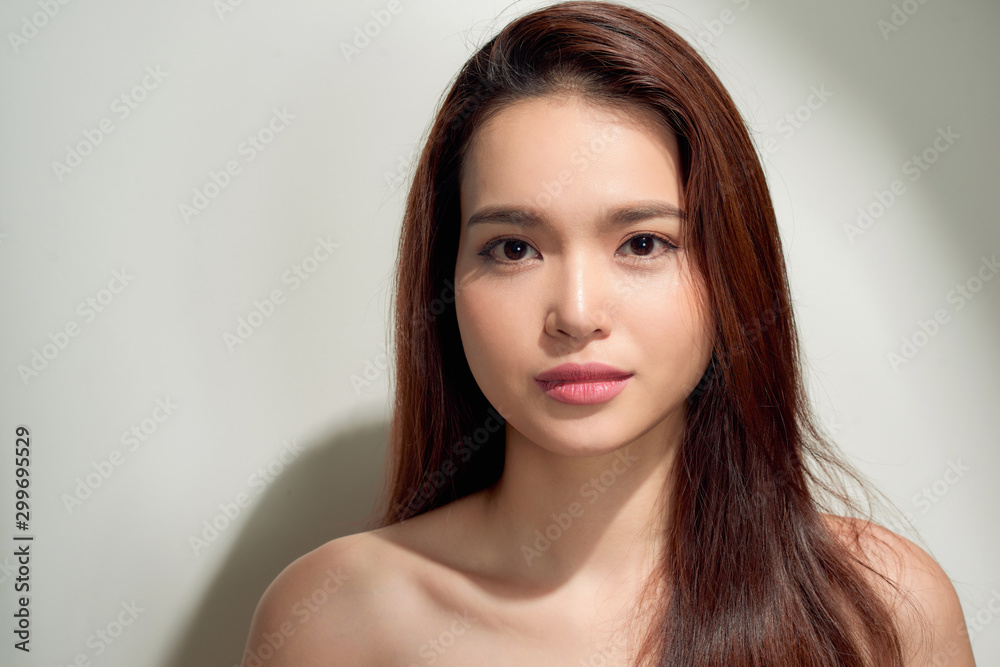 Beauty sunshine girl portrait. Pretty happy woman enjoying summer outdoors in bright Sunny day