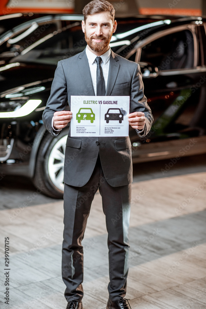 Sales consultant with a drawing on the topic of eco-friendly electric cars