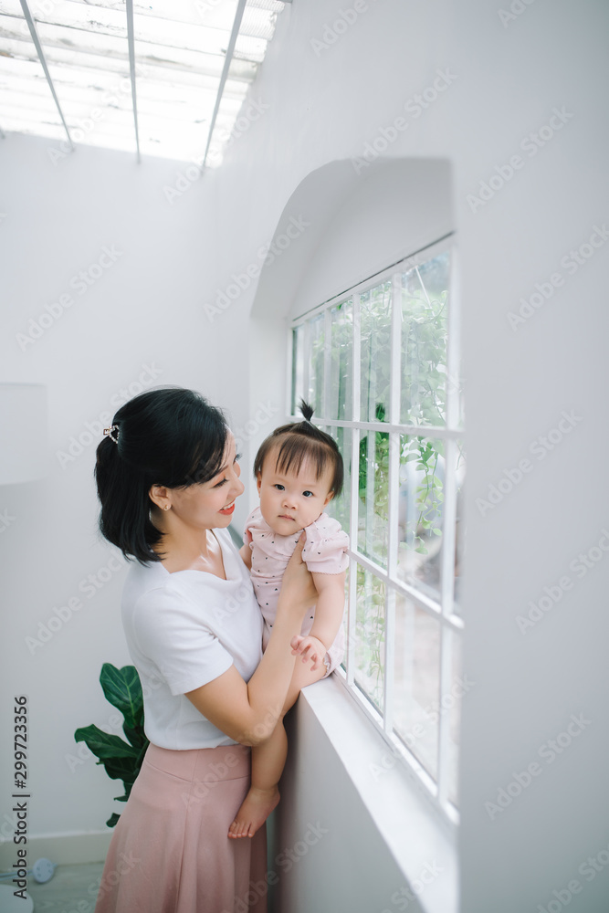 young asian mother and baby