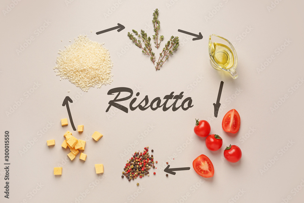 Raw ingredients for risotto on light background