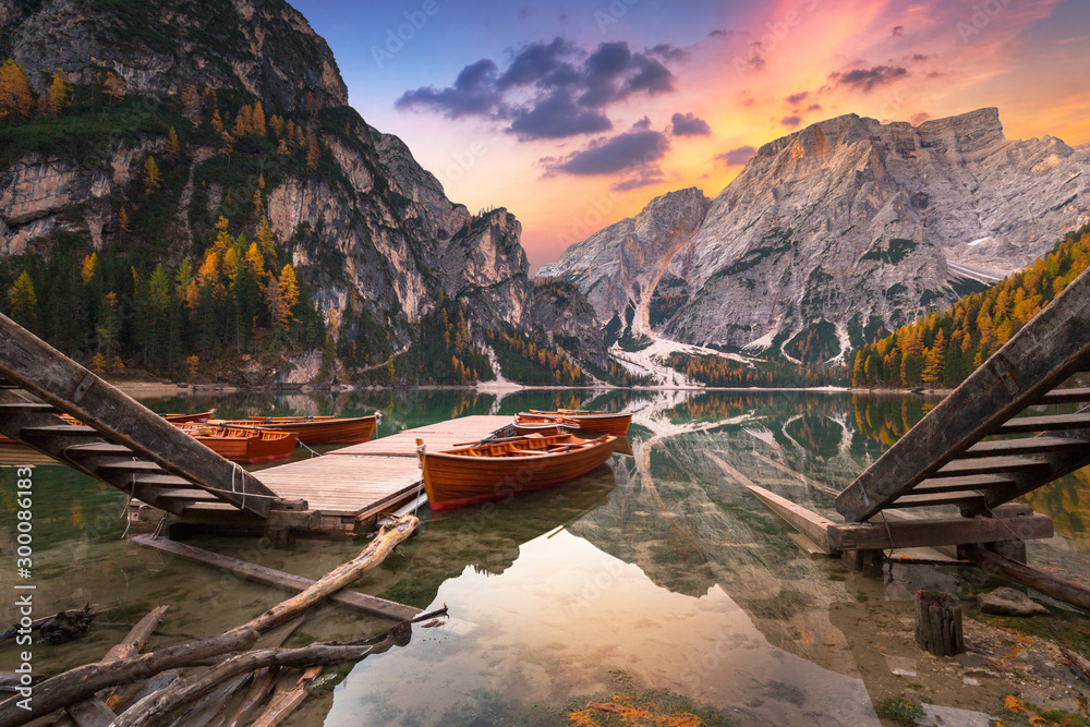 Lago di Braies lake and Seekofel peak at sunrise, Dolomites. Italy