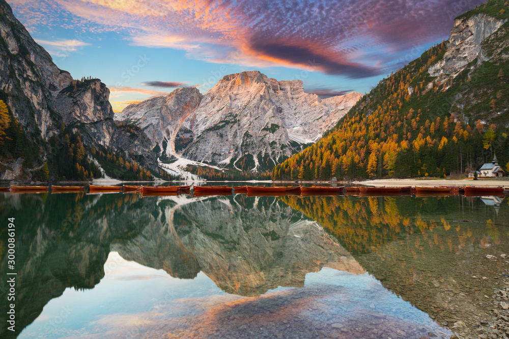 Lago di Braies lake and Seekofel peak at sunrise, Dolomites. Italy