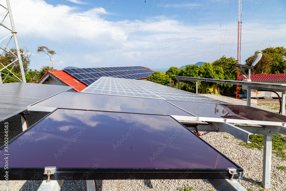 Solar panels,wind turbines on sky background,natural Energy