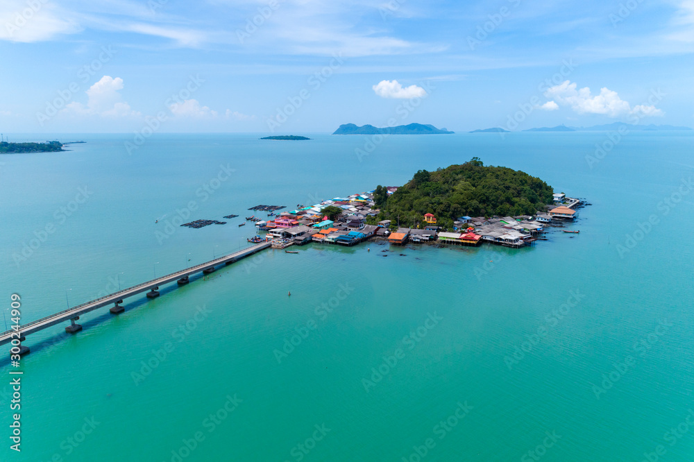 Beautiful small island in tropical sea with small bridge to the island located koh rat suratthani Th