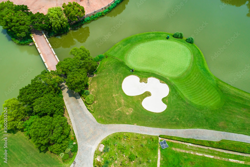 Aerial view of golf course and water