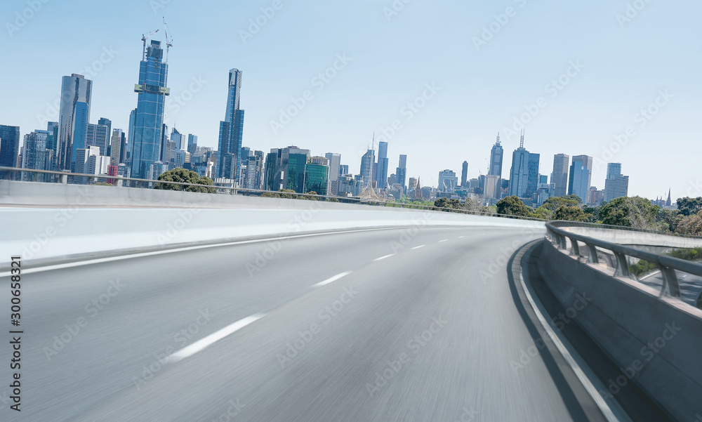 Highway overpass motion blur with Melbourne city