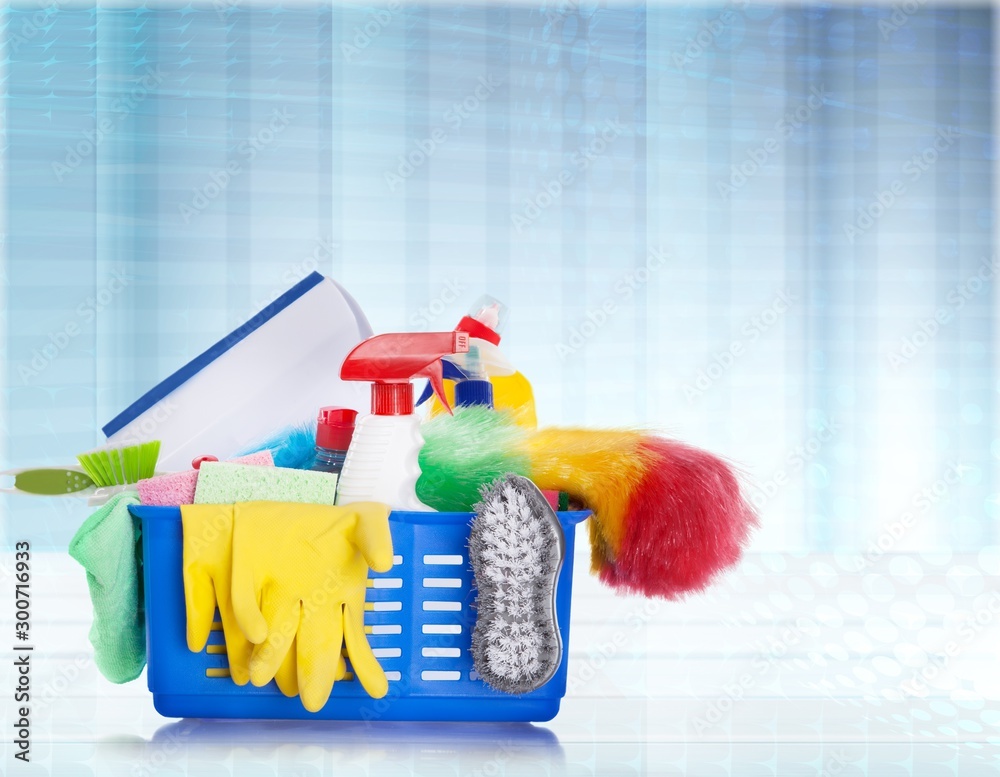 Plastic bottle, cleaning  gloves and bucket on background