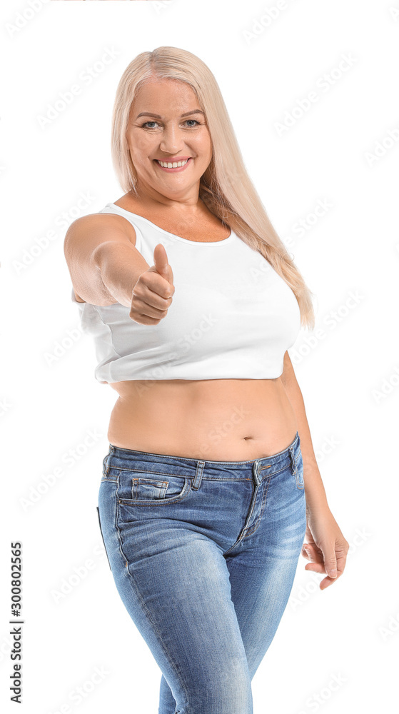 Mature body positive woman showing thumb-up on white background