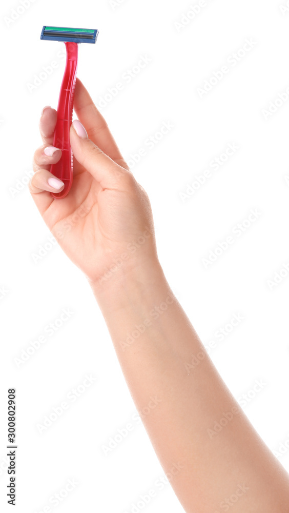 Female hand with razor on white background