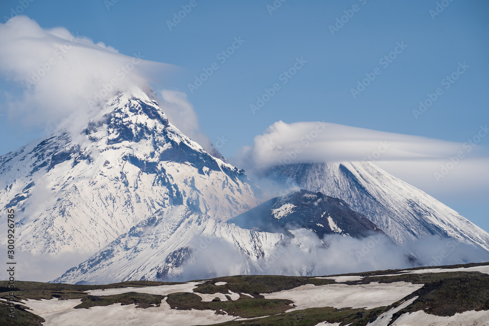 Nature of Kamchatka - beautiful volcanic landscape: view on Kamen Volcano, active Klyuchevskoy Volca