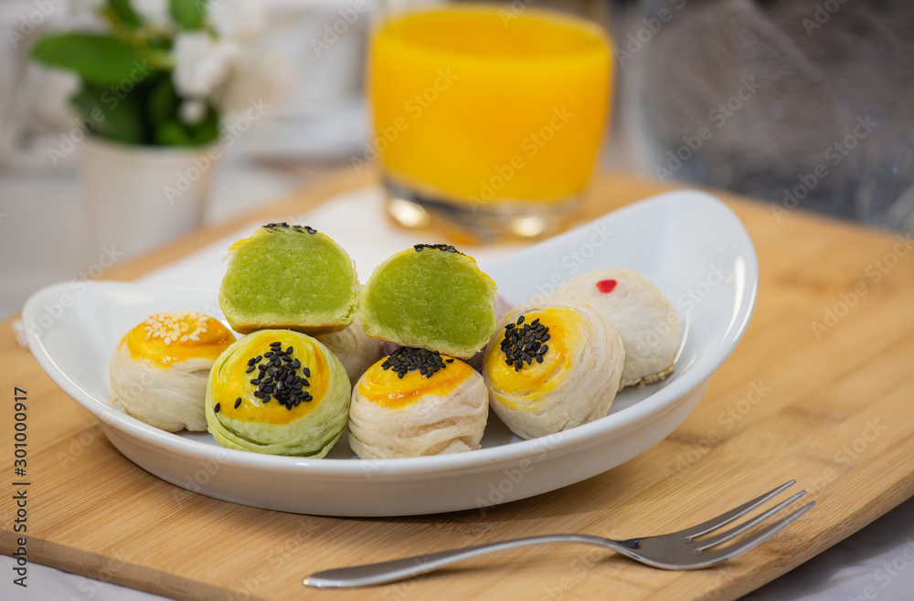 Dessert Mochi or Chinese pastry-bean cake with egg yolk.