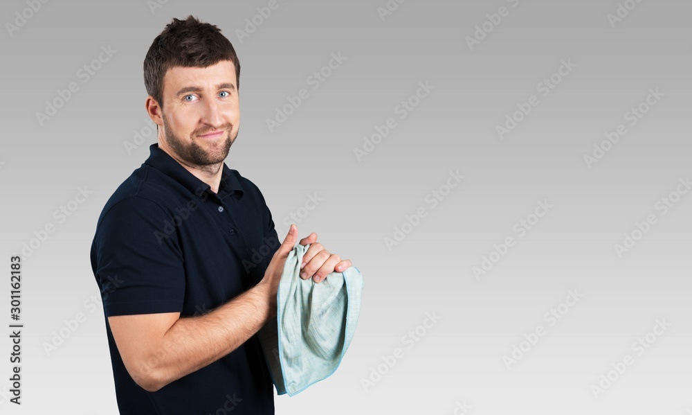 Portrait of cheerful Handsome  mechanic  on background