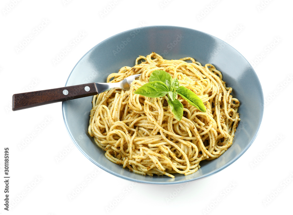 Plate with tasty pasta and pesto sauce on white background