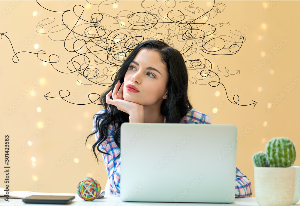 Solving a problem concept with young woman using a laptop