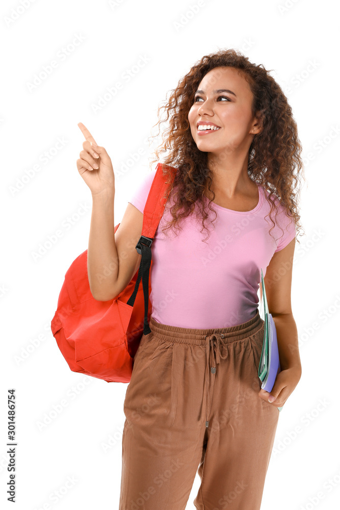 Portrait of African-American student showing something on white background