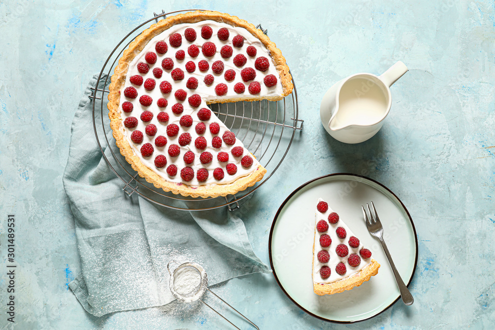 Tasty berry pie and milk on color background