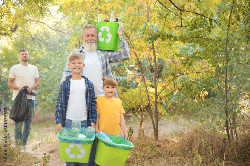 Volunteers with garbage outdoors. Concept of recycling