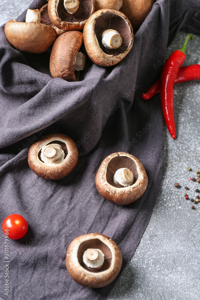 Fresh champignon mushrooms on table