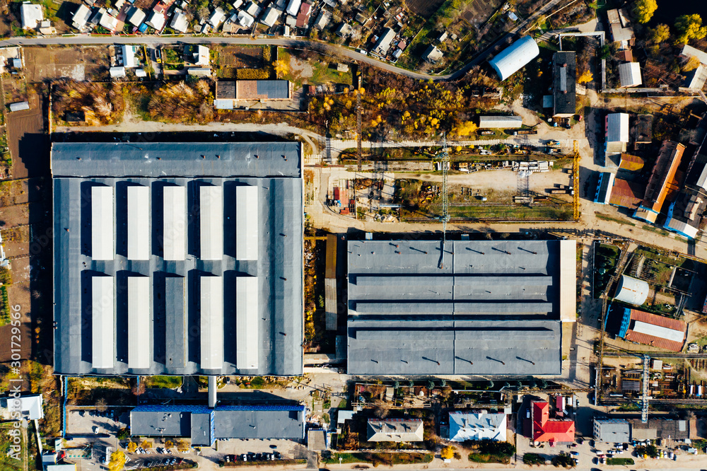 Large modern factory building. Machine building production site, top view on facility, aerial view, 