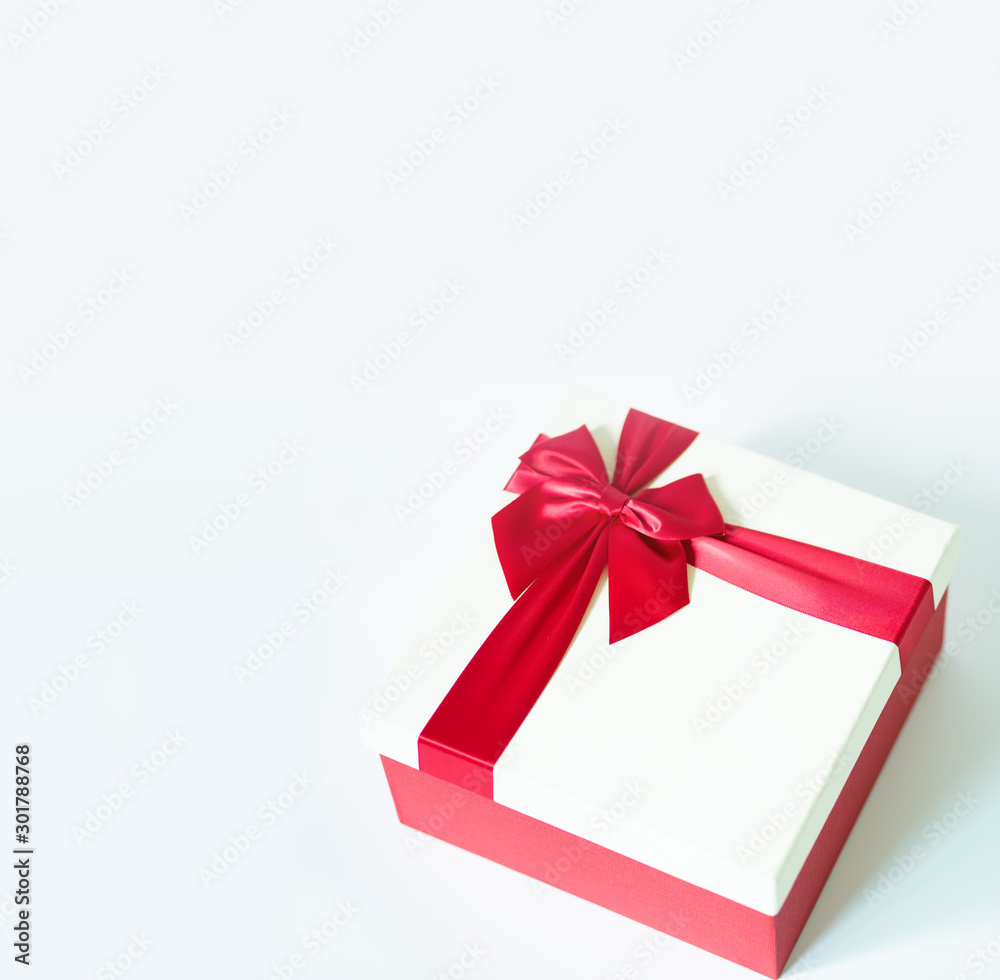 gift box with red ribbon on white background.Christmas and New Years gift concept.