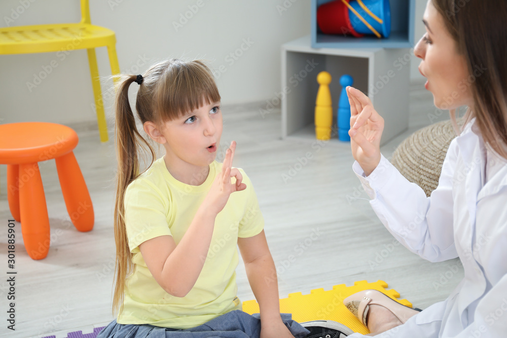 Cute little girl at speech therapist office