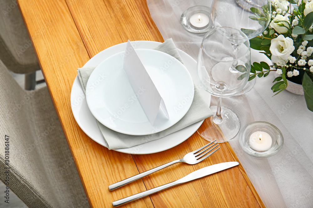 Beautiful table setting for wedding celebration in restaurant