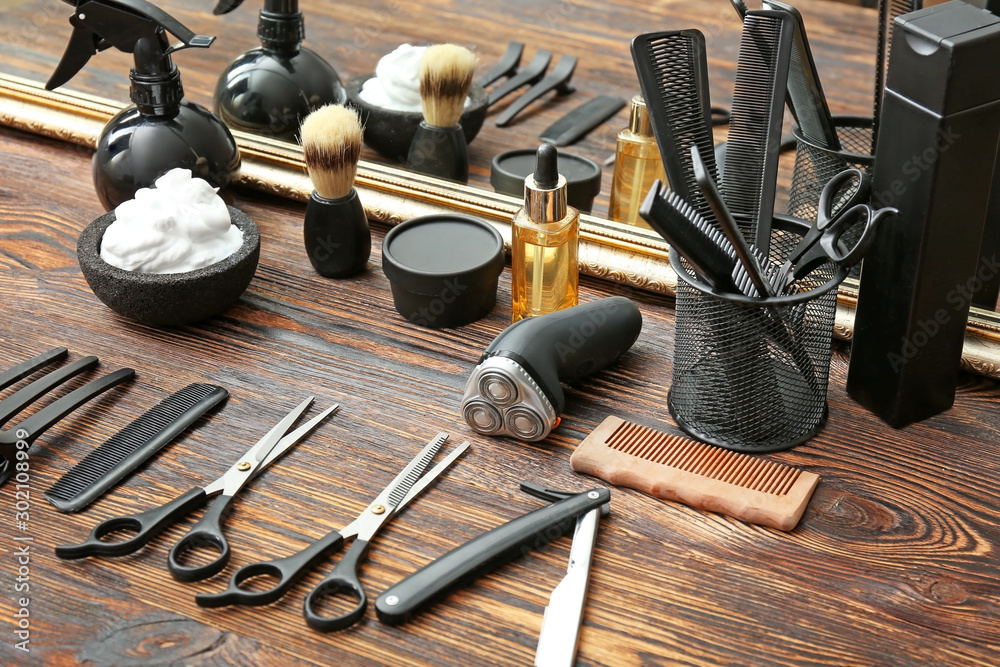 Professional barbers tools on table in salon