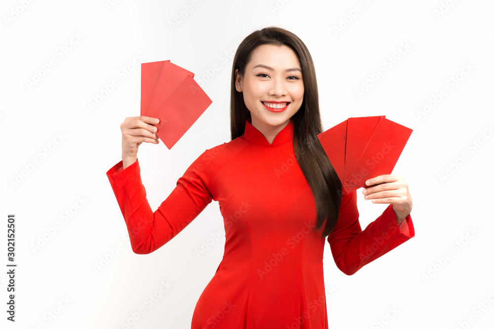 Asian woman showing red envelopes for lunar new year