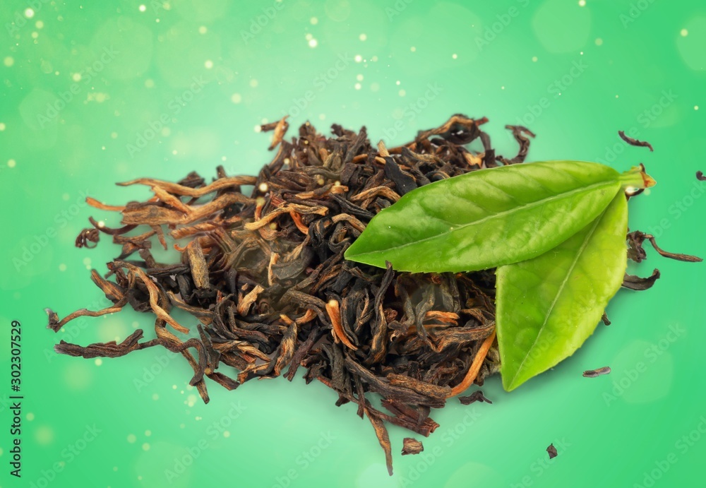 Tea and leaves isolated on white background