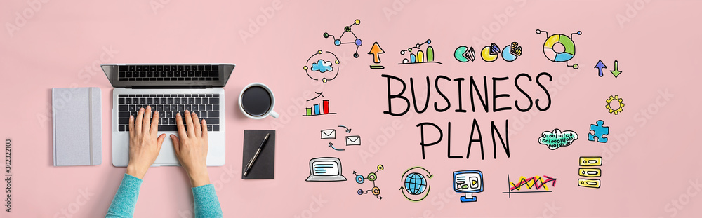 Business plan with person using a laptop computer