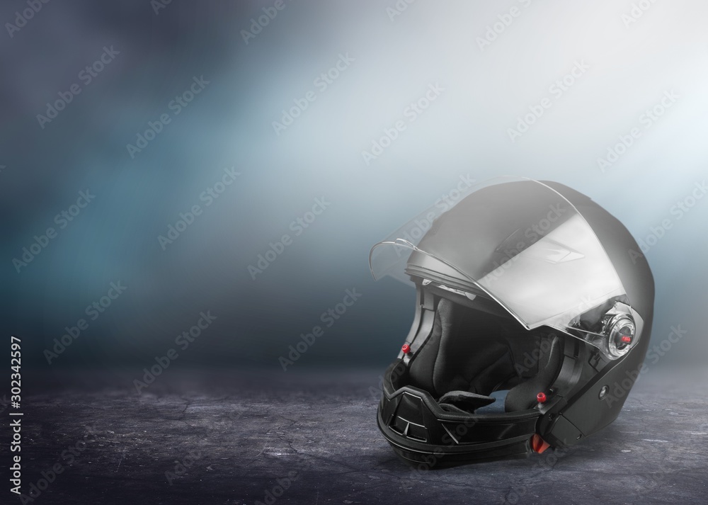 Black biker helmet isolated on white background