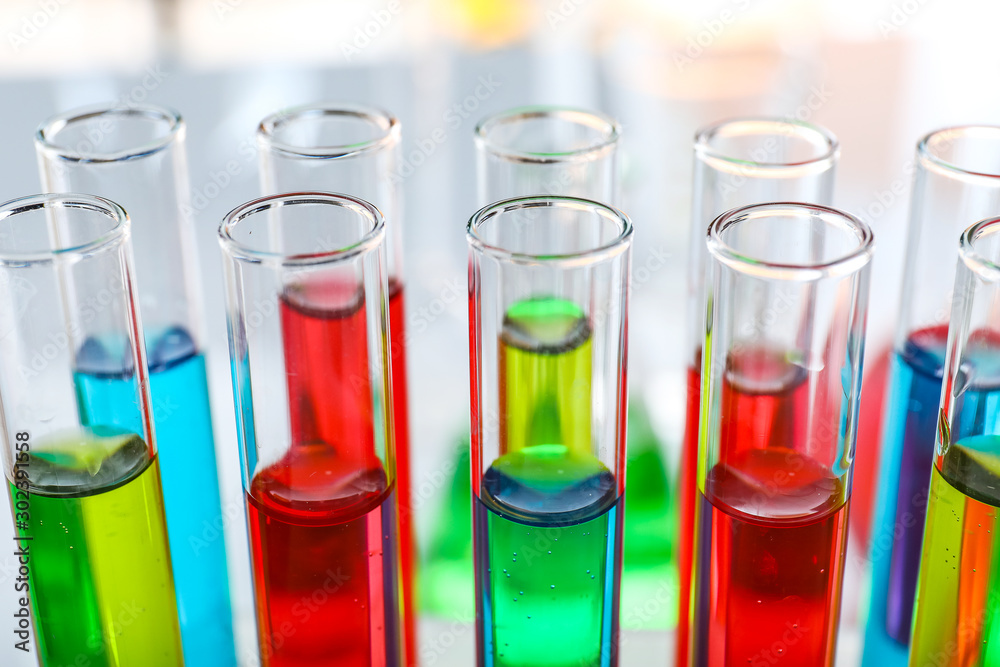 Test tubes with colorful samples, closeup