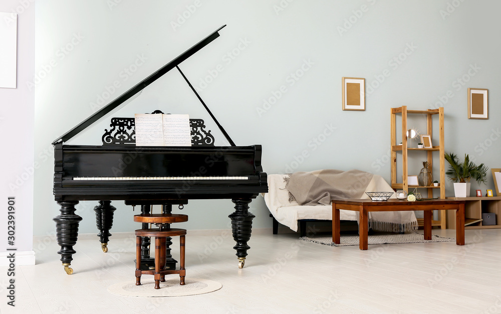 Interior of room with stylish grand piano