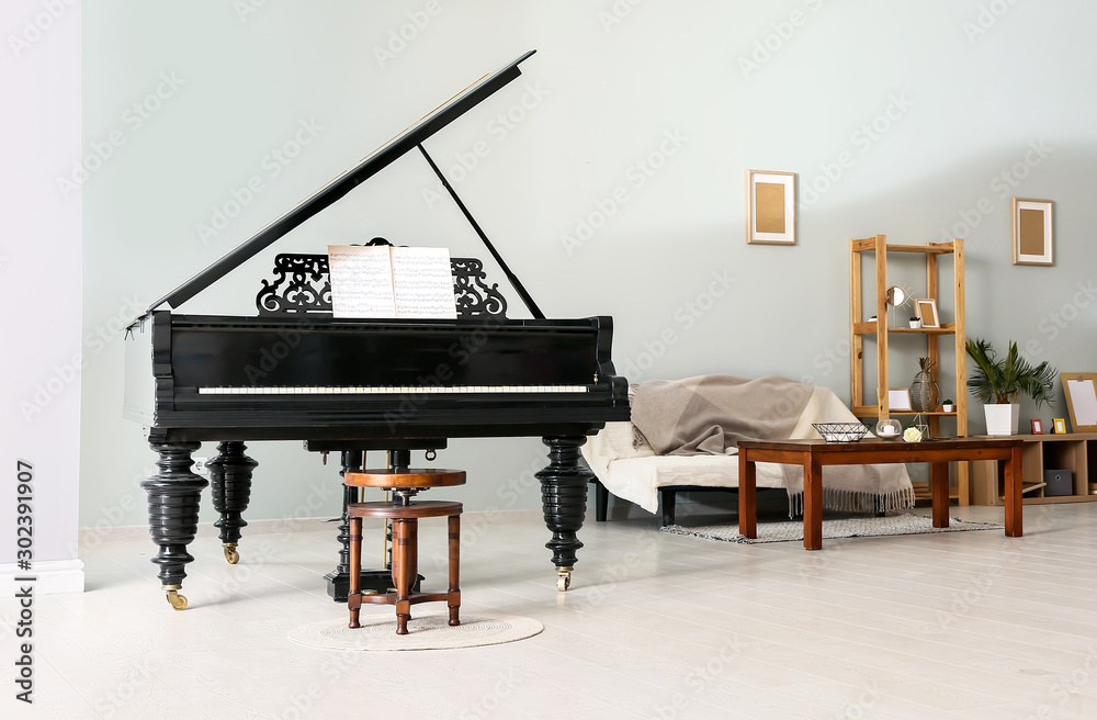 Interior of room with stylish grand piano