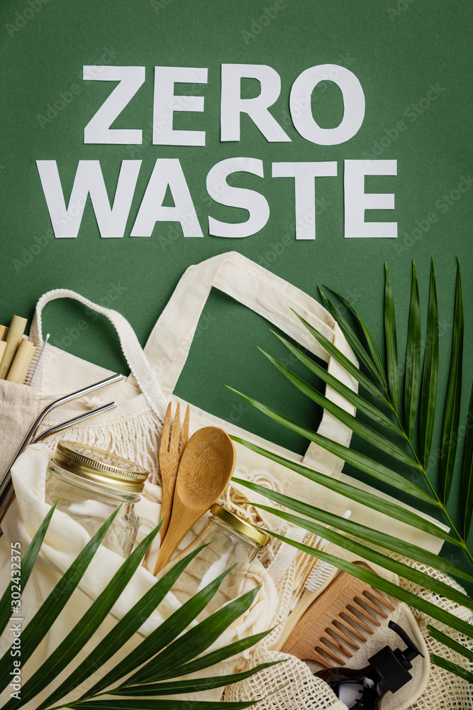 Zero waste concept. Cotton bag, bamboo cultery, glass jar, bamboo toothbrushes, hairbrush and straws