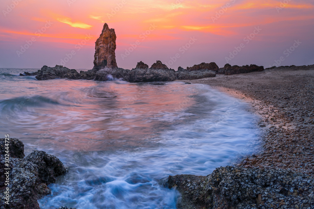 Seaside house and rock beach  at the sunset for back ground and beautiful view seascape.