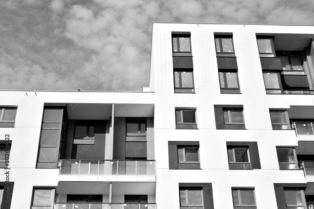 Contemporary apartment building. Generic residential architecture. Black and white.