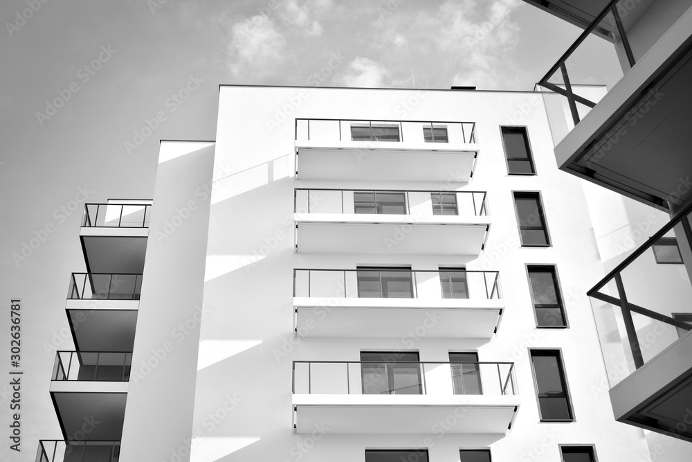 Contemporary apartment building. Generic residential architecture. Black and white.